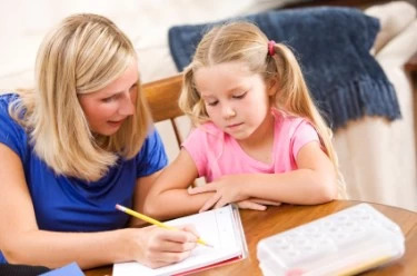 iStock-mom-and-daughter-writing1