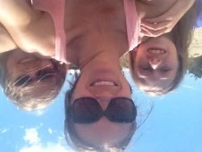 babysitter with kids at beach