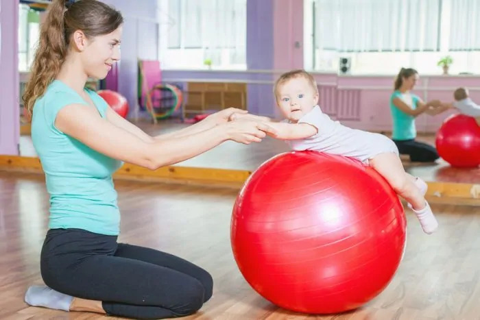 mom baby red exercise happy