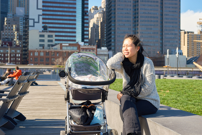 upper west side mom relaxing with baby stroller