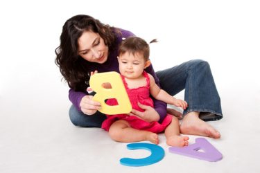 Nanny teaching alphabet