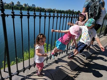 kids outside central park water summer