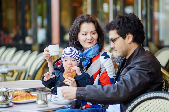 parents at cafe with toddler