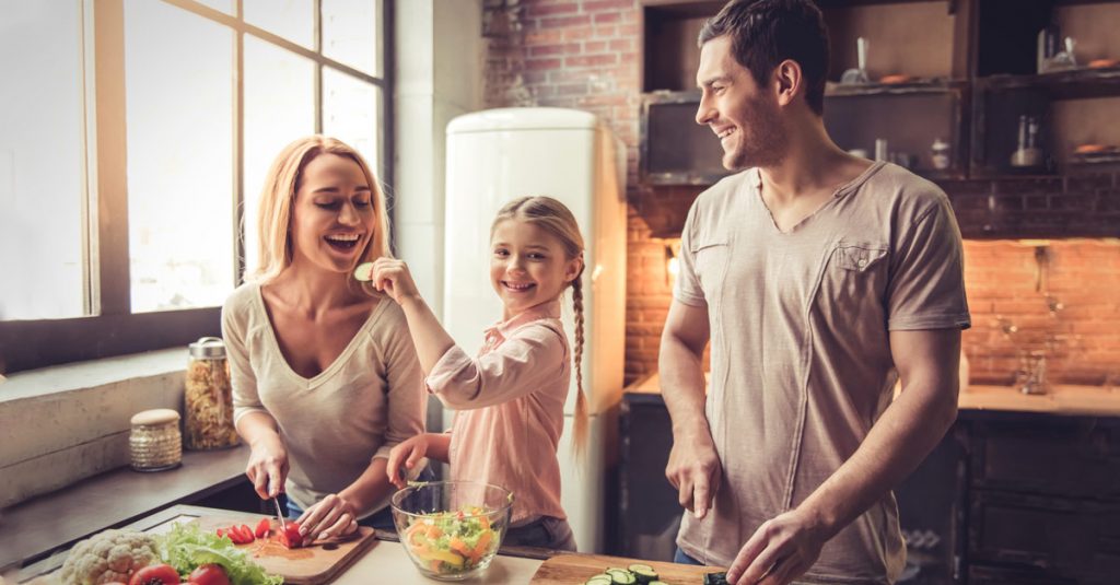 family bonding while preparing a healthy meal