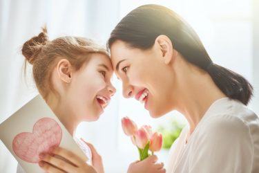 Mother and daughter with valentine