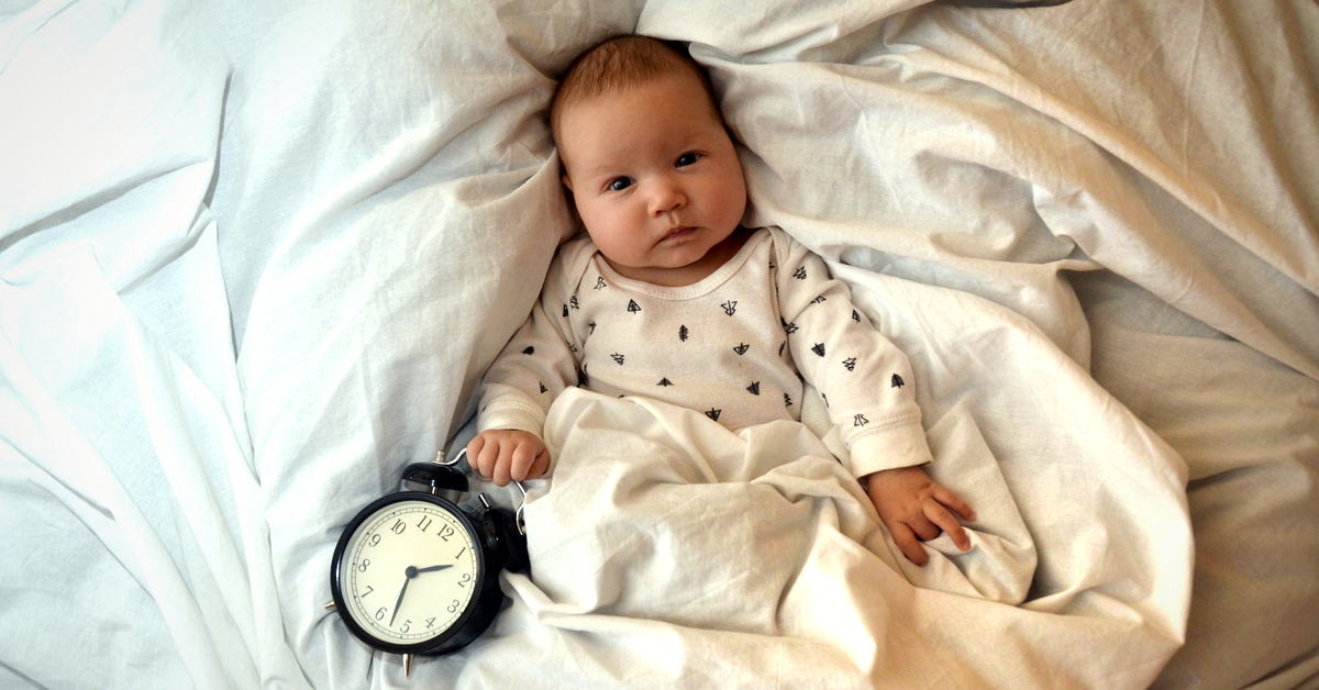 baby on schedule with clock