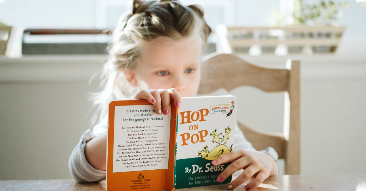 girl reading hop on pop