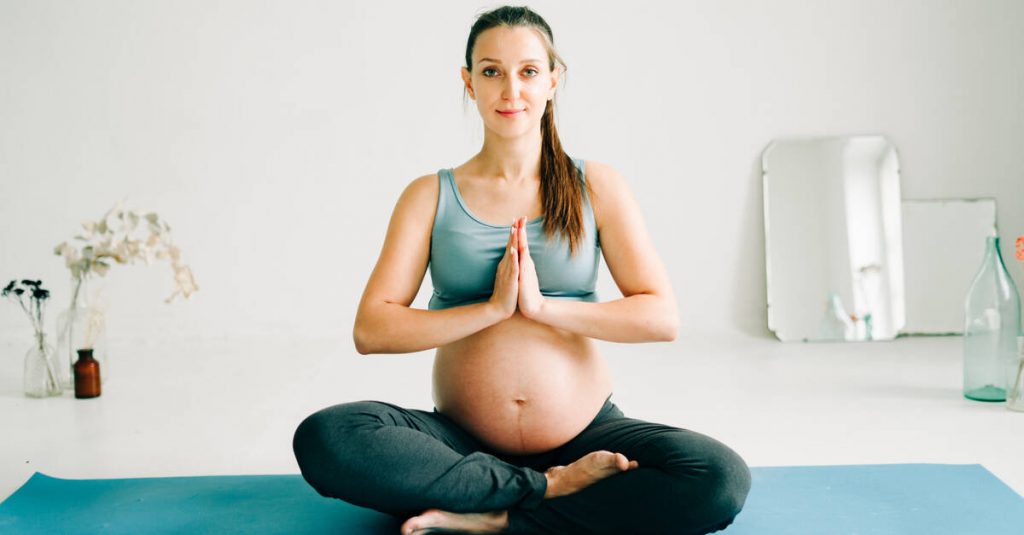 pregnant woman practicing labor mantras