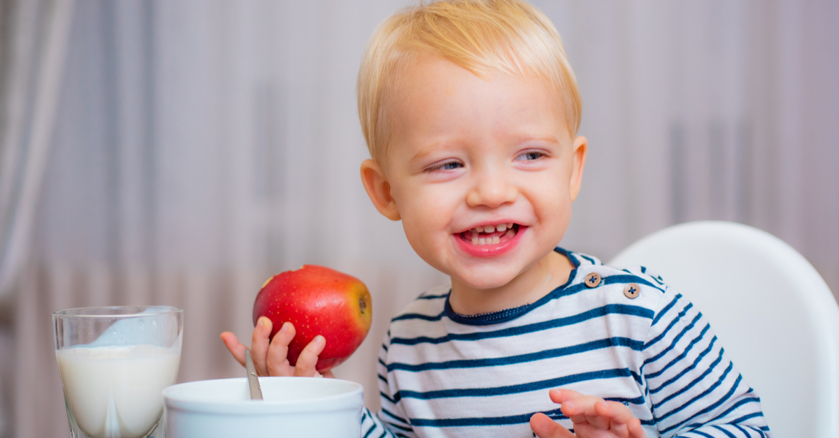 toddler eating healthy snack