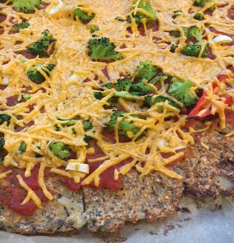   vegan Cauliflower Pizza with cheese, broccoli and tomato sauce, Boost your Child's Immunity during cold season