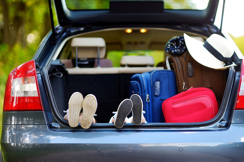 car ride, trip, vacation, transportation, kids, shoes, suitcase, hat, car, red, blue, brown, trunk