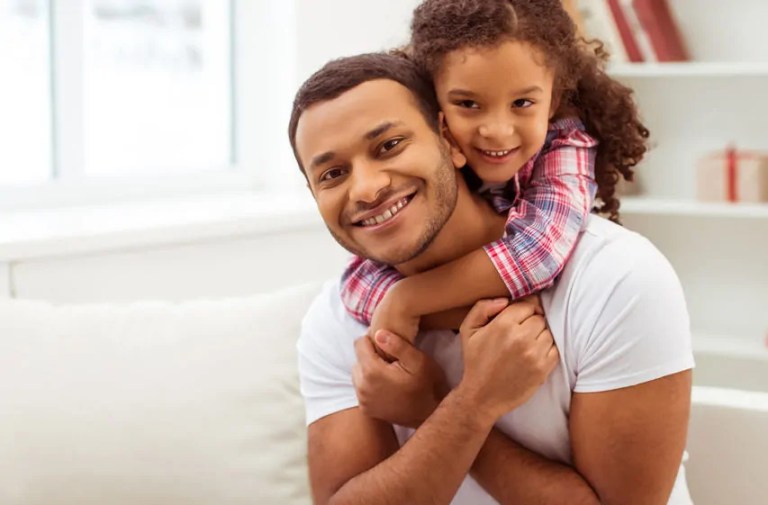 happy father and daughter