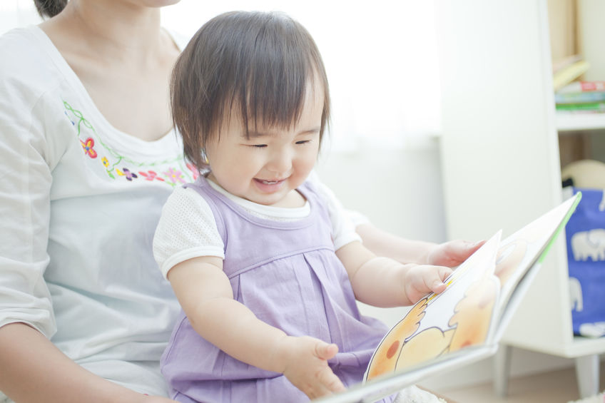 mom, child, daughter, toddler, book, dress, shirt, purple, white, light, couch, sitting