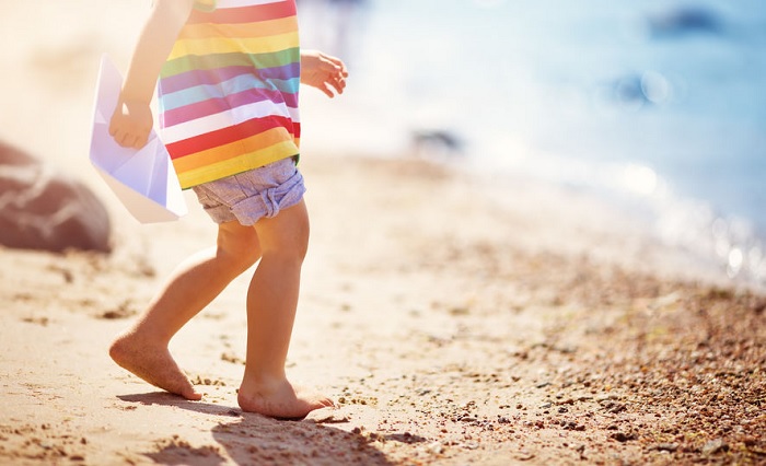 toddler, child, kid, beach, sand, water, summer, rainbow shirt, feet, salt water, sea, ocean