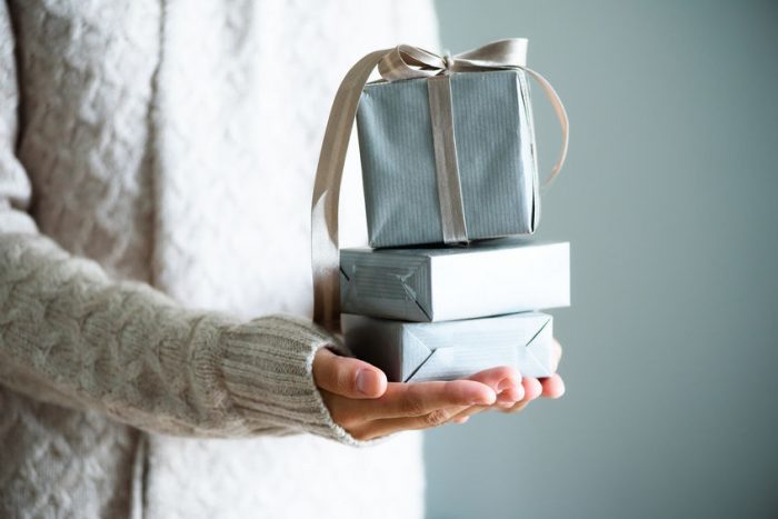 gift box, hands, bow, sweater, wall, blue, silver