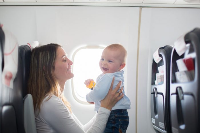 mother and baby on airplane