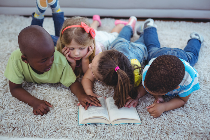 diverse group of children reading