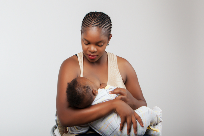 black woman breastfeeding baby