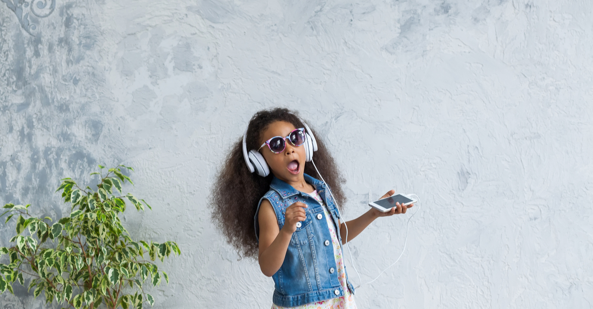 young girl listening to music