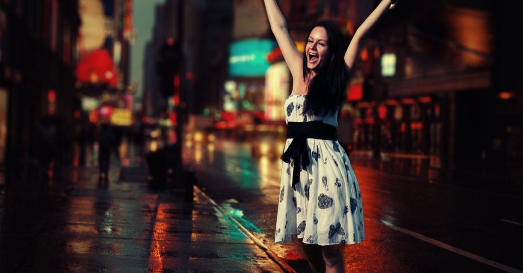 woman enjoying night off in nyc at night