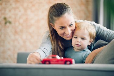 babysitter playing with toddler