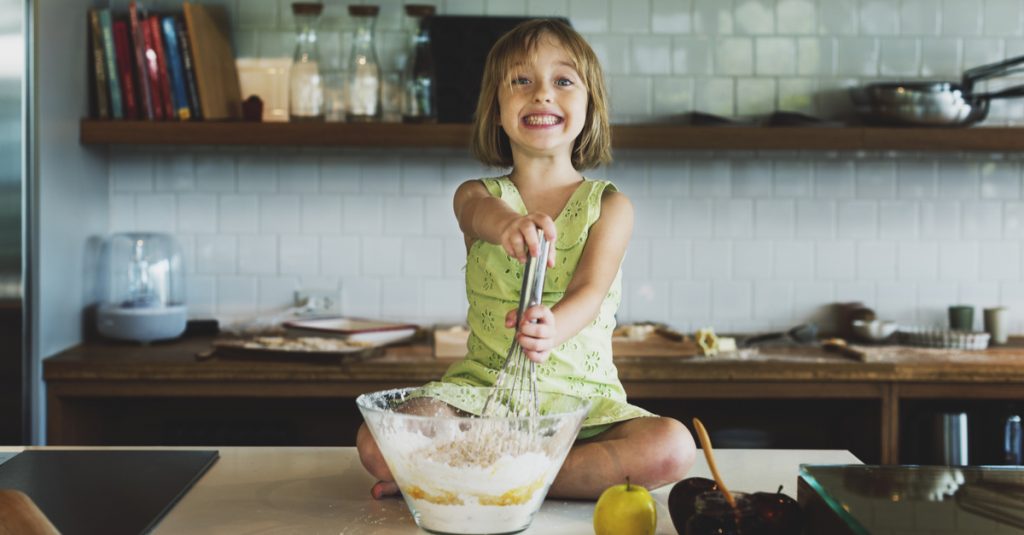 girl in kids cooking class