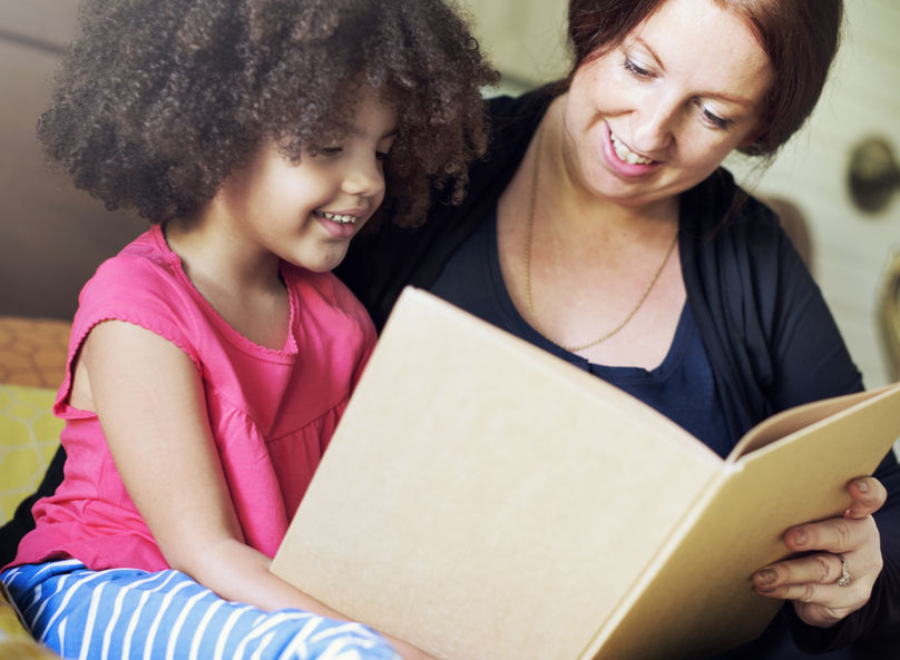 Mom reading with her child