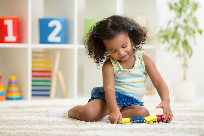 Child playing with toy