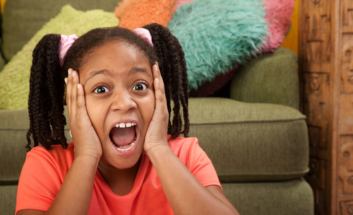 Overwhelmed girl with Sensory Processing Disorder